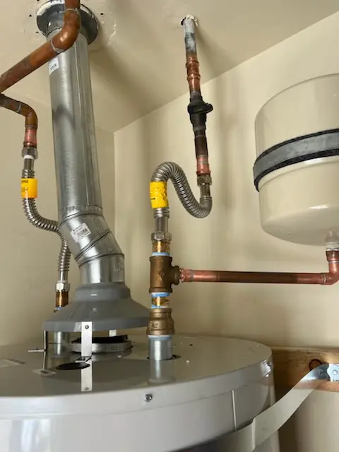 Water heater installation and plumbing repair in Devon Hunt